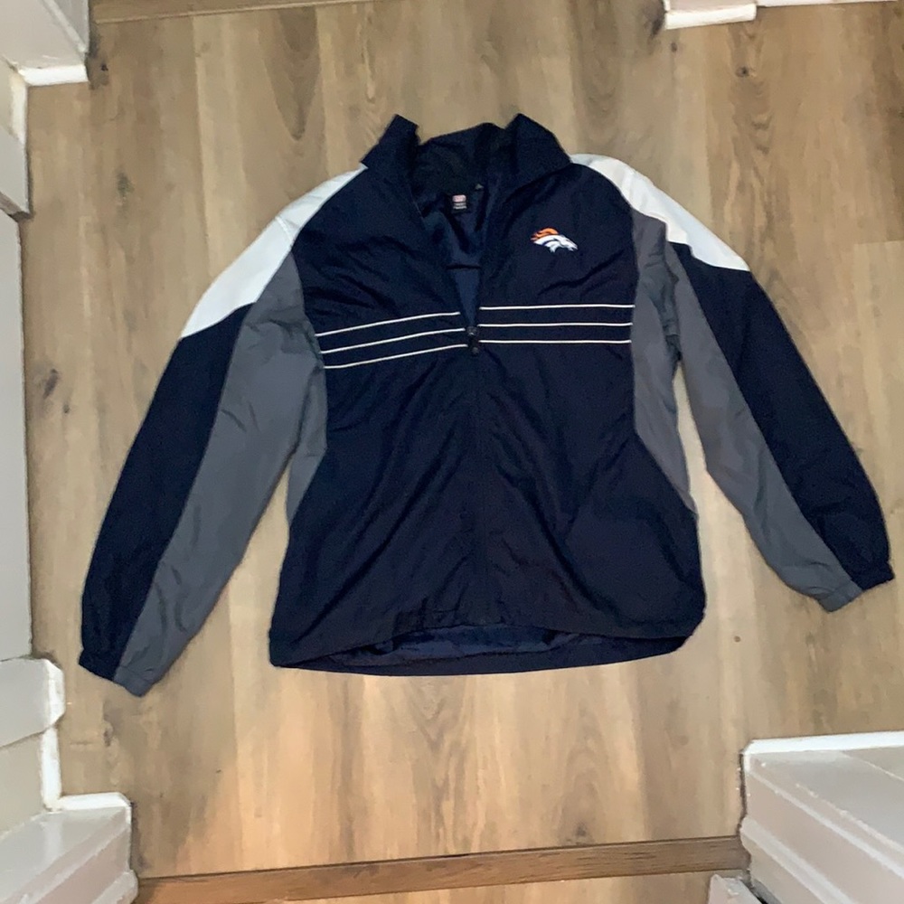 NFL Licensed Reebok Brand Denver Bronco Full Zip Windbreaker Jacket.